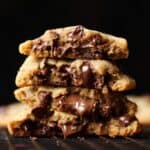 Thick Nutella Stuffed Cookies are chocolate chip cookies with Nutella baked inside