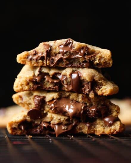 Thick Nutella Stuffed Cookies are chocolate chip cookies with Nutella baked inside