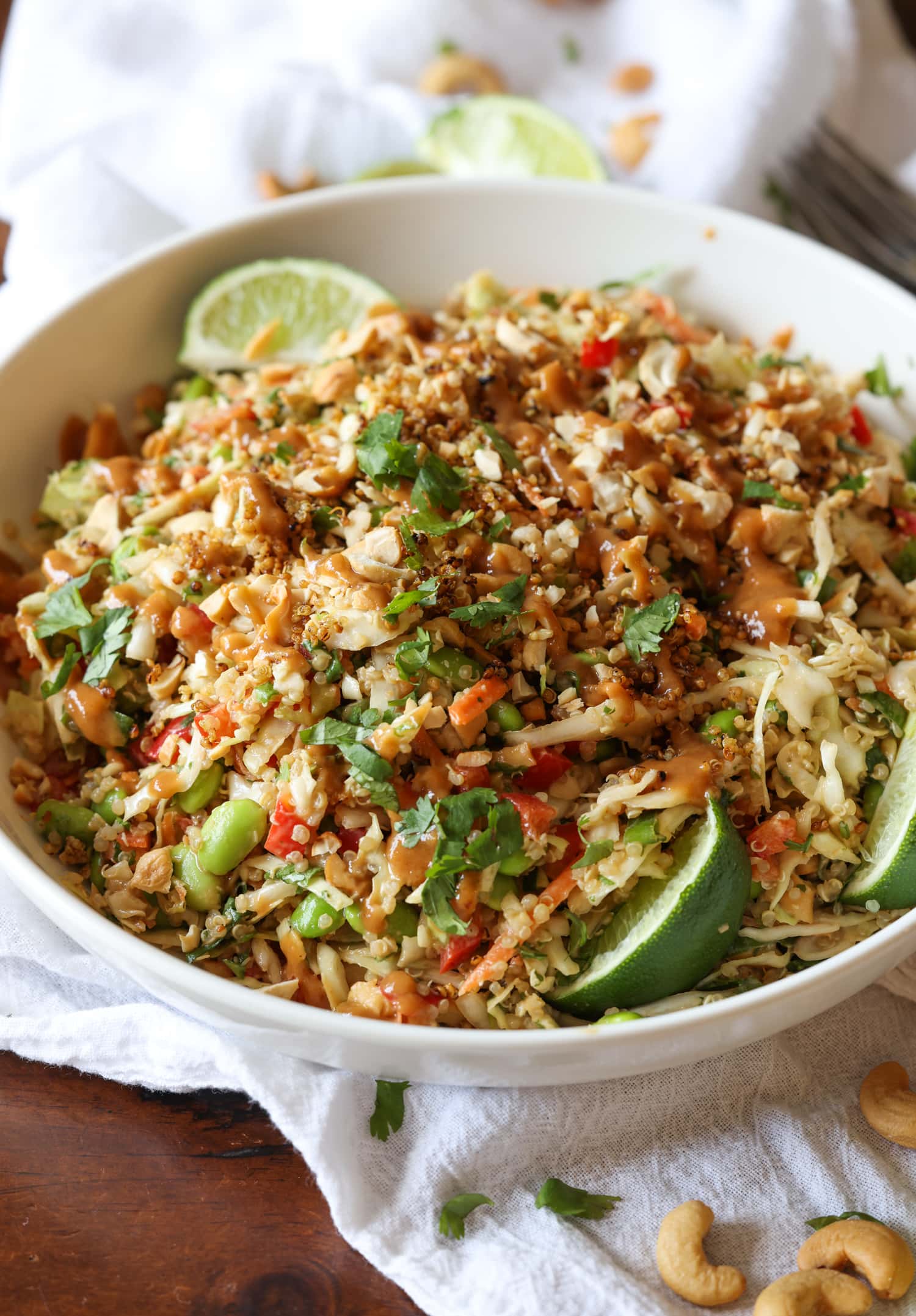 Quinoa salad topped with Thai dressing and crunchy quinoa