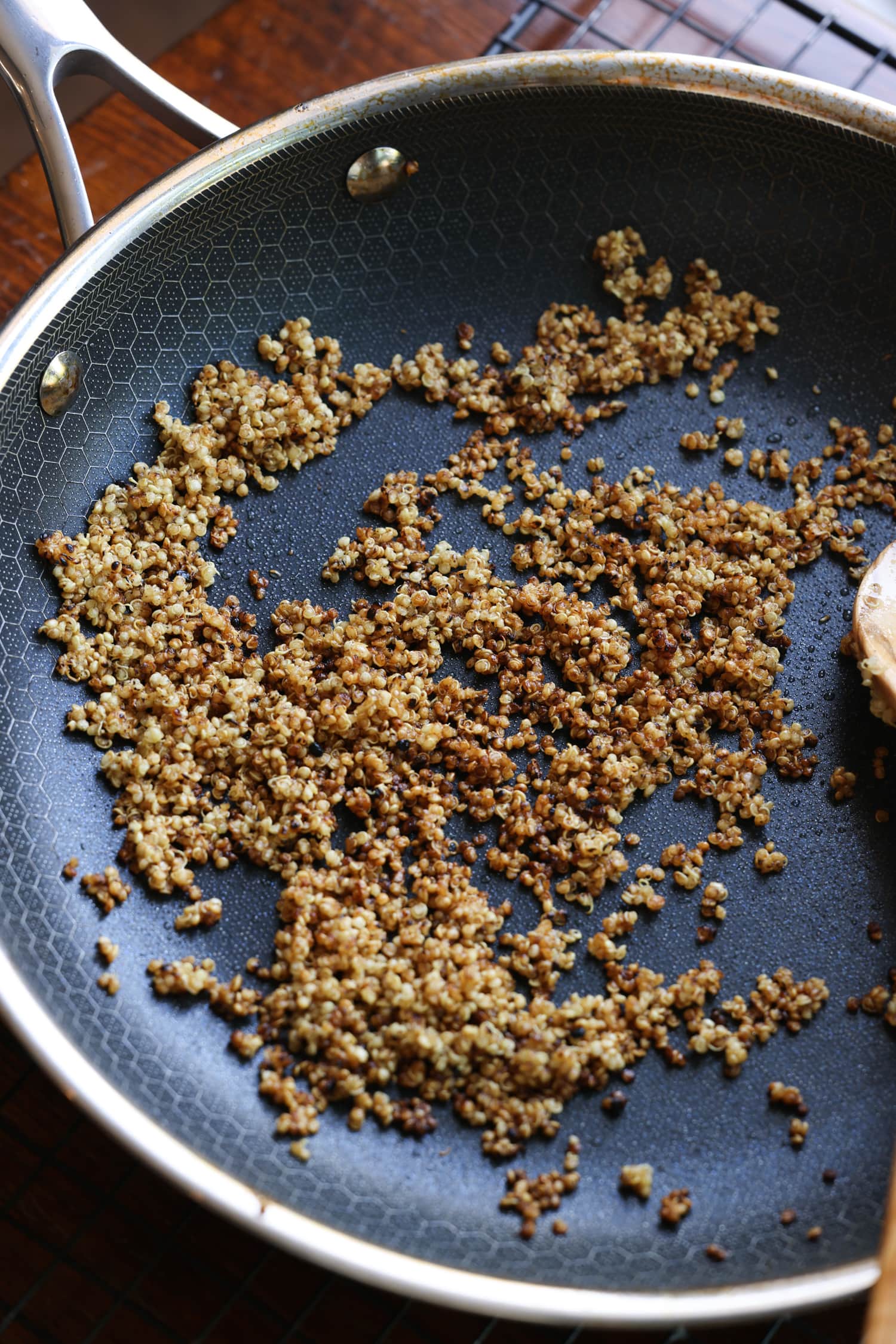 toasted quinoa in a skillet
