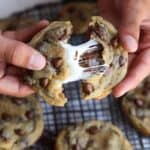Smores Stuffed Chocolate Chip Cookies with gooey marshmallows inside