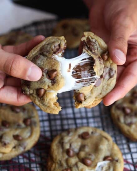 Smores Stuffed Chocolate Chip Cookies with gooey marshmallows inside