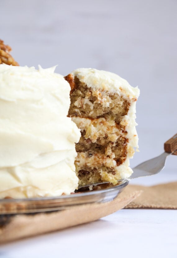 Hummingbird Cake topped and filled with cream cheese frosting