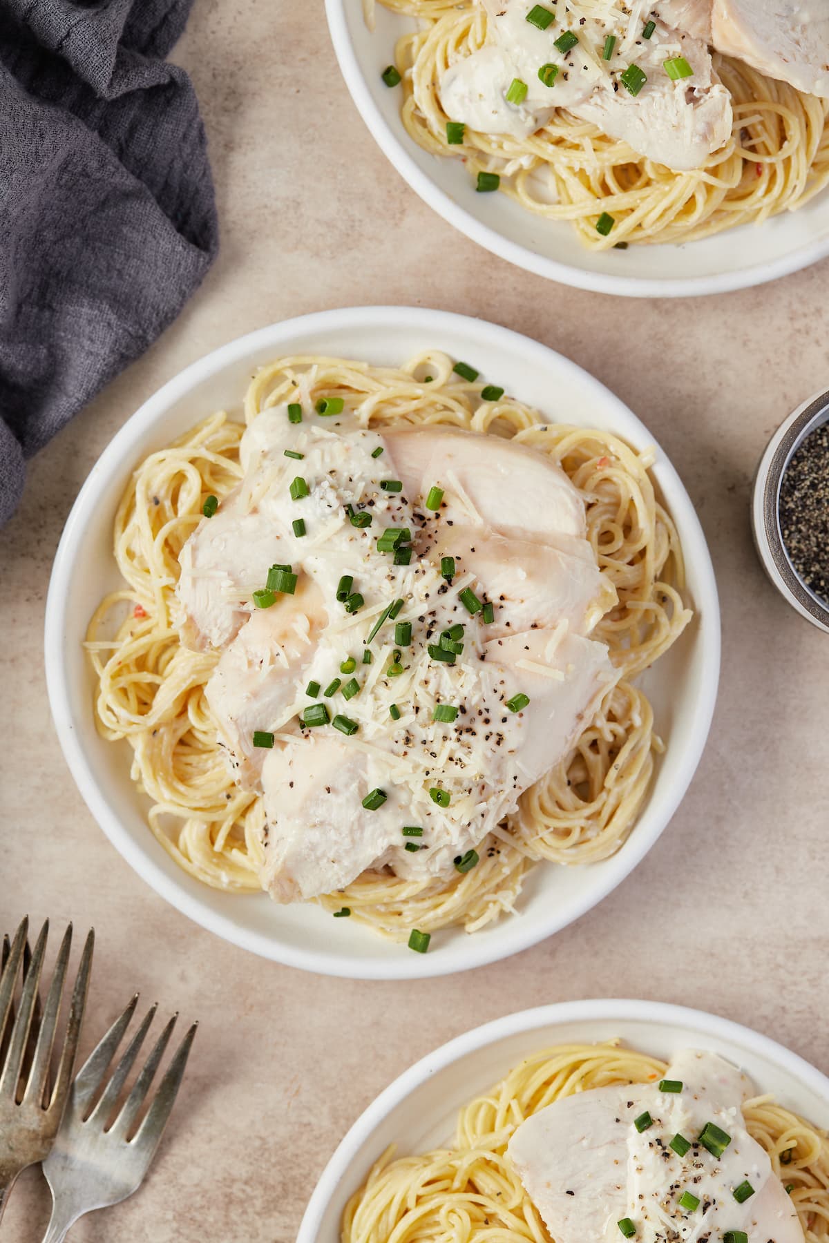 Plates of creamy chicken pasta.