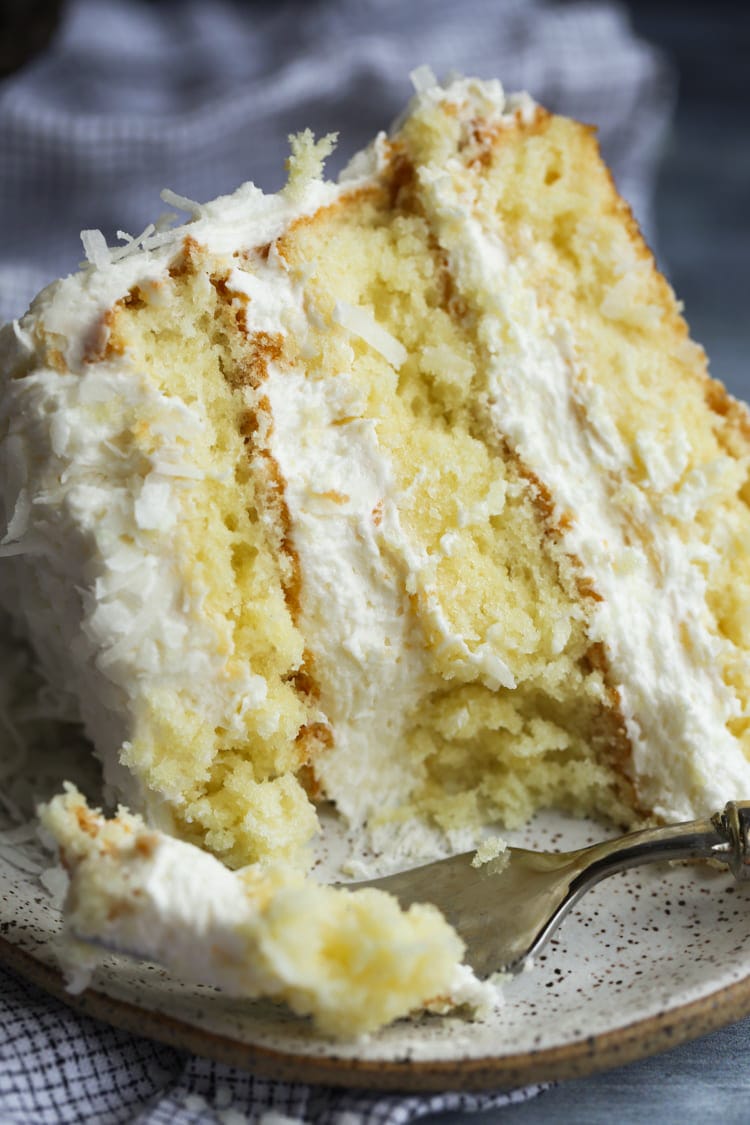 Coconut Cake With a Bite Taken Out