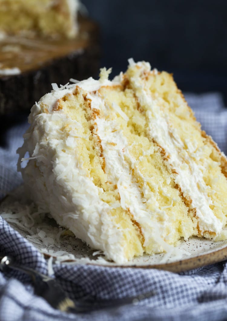 Coconut cake sliced on a plate