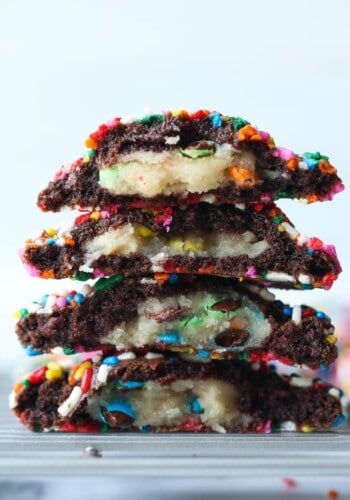 M&M Cookie Dough Stuffed inside of a chocolate sprinkle cookie