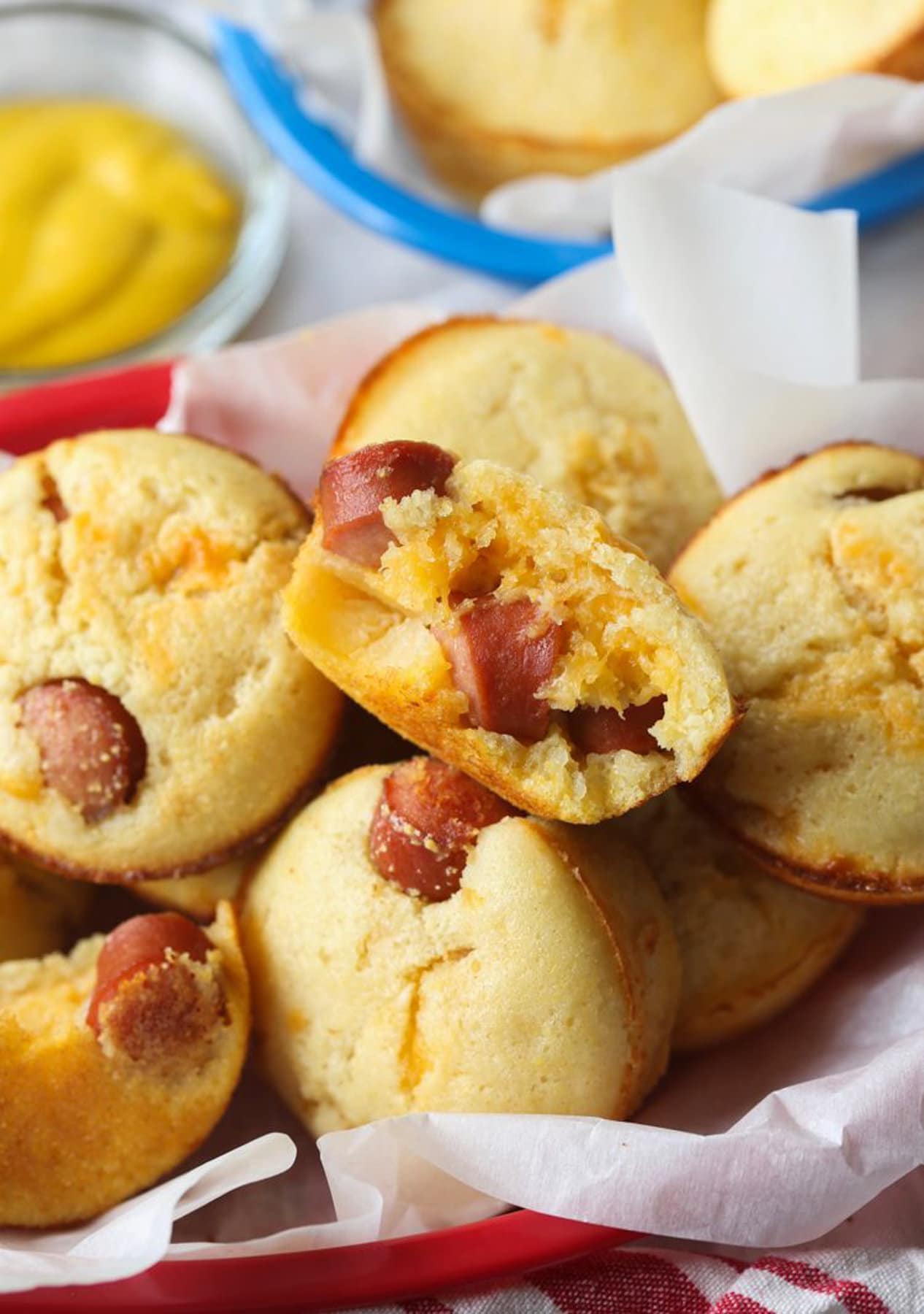 Muffins split in half showing mini cocktail wiener 