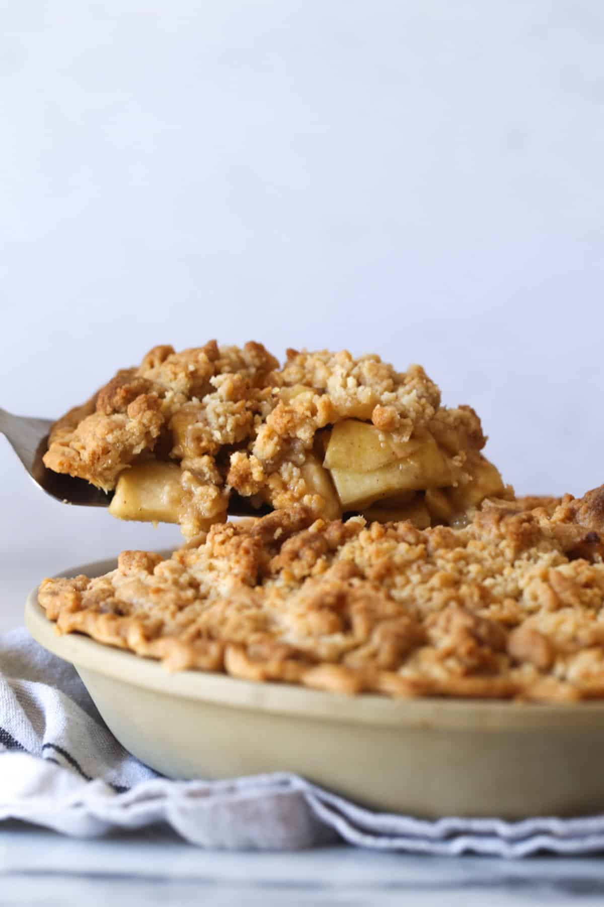 Serving a slice of Dutch apple pie