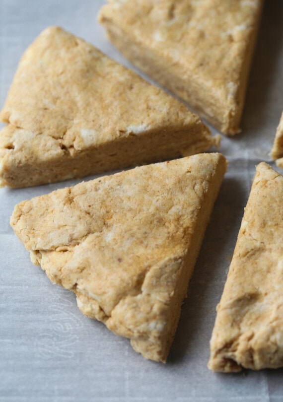 Overhead view of triangles of scone dough.