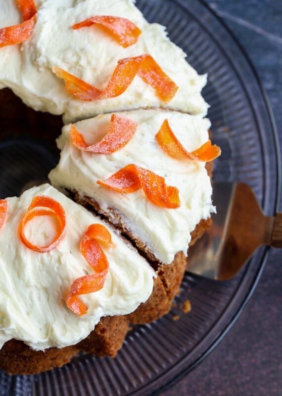 Carrot Pound Cake topped with cream cheese frosting and candied carrots