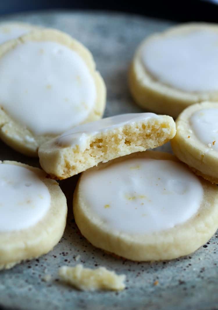 Assorted Lemon Meltaway Cookies, with one cookie broken in half.