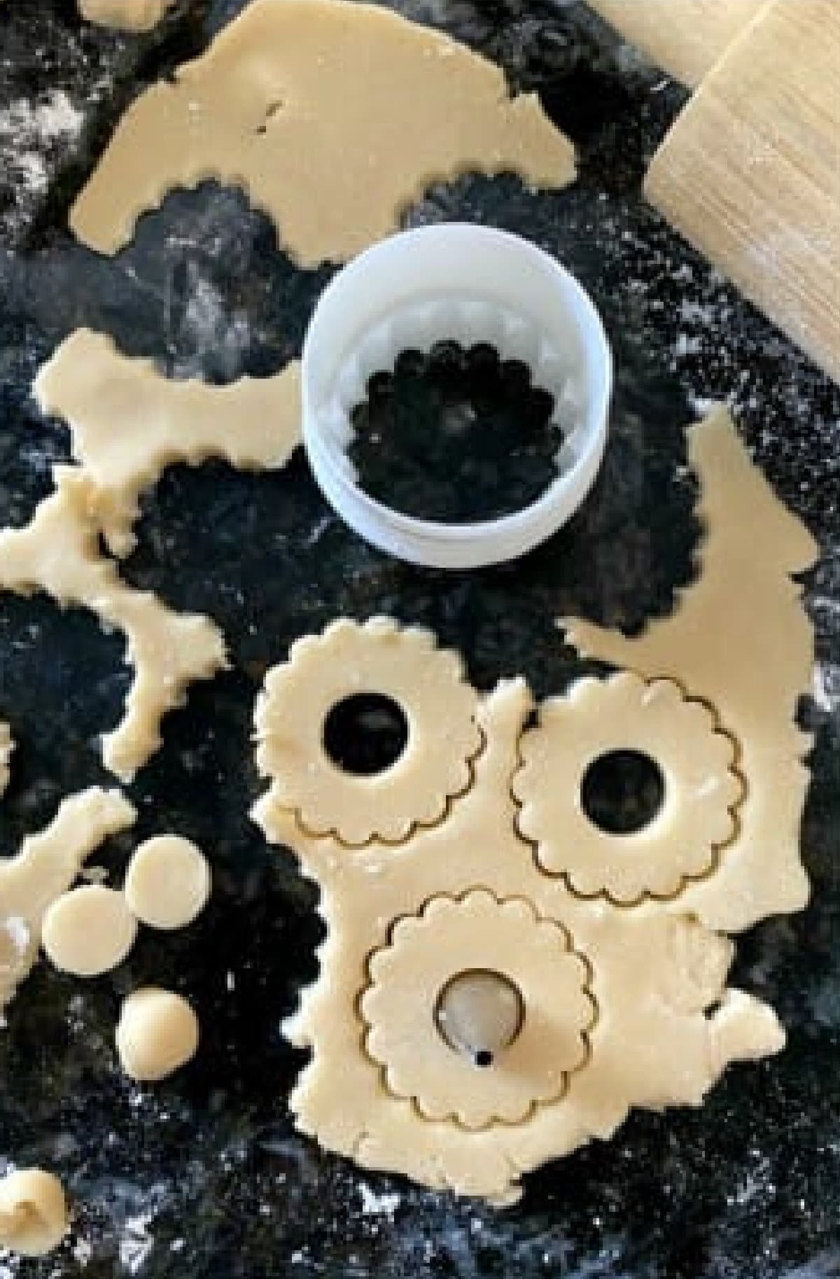 Cutting out dough to make Linzer Cookies