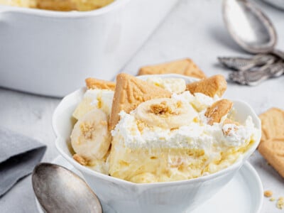 Banana pudding in a bowl with a spoon.