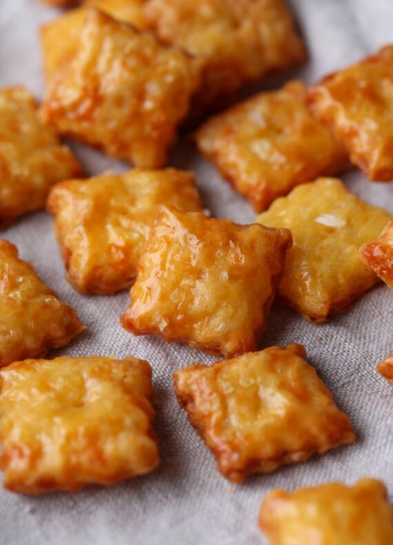 Homemade Cheez Its on a baking sheet