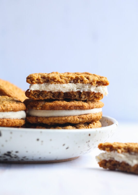 Soft Oatmeal Sandwich Cookies stacked and broken in half