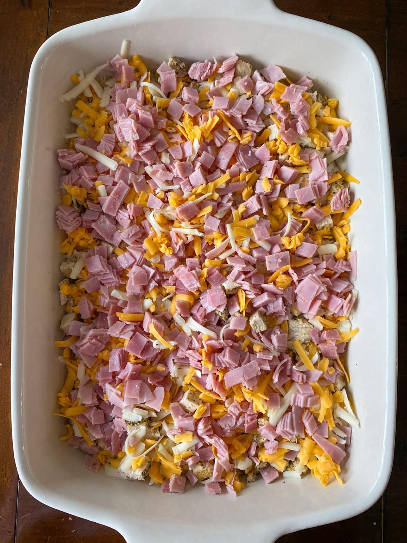 Chicken cheese and ham in a 9x13 pan.