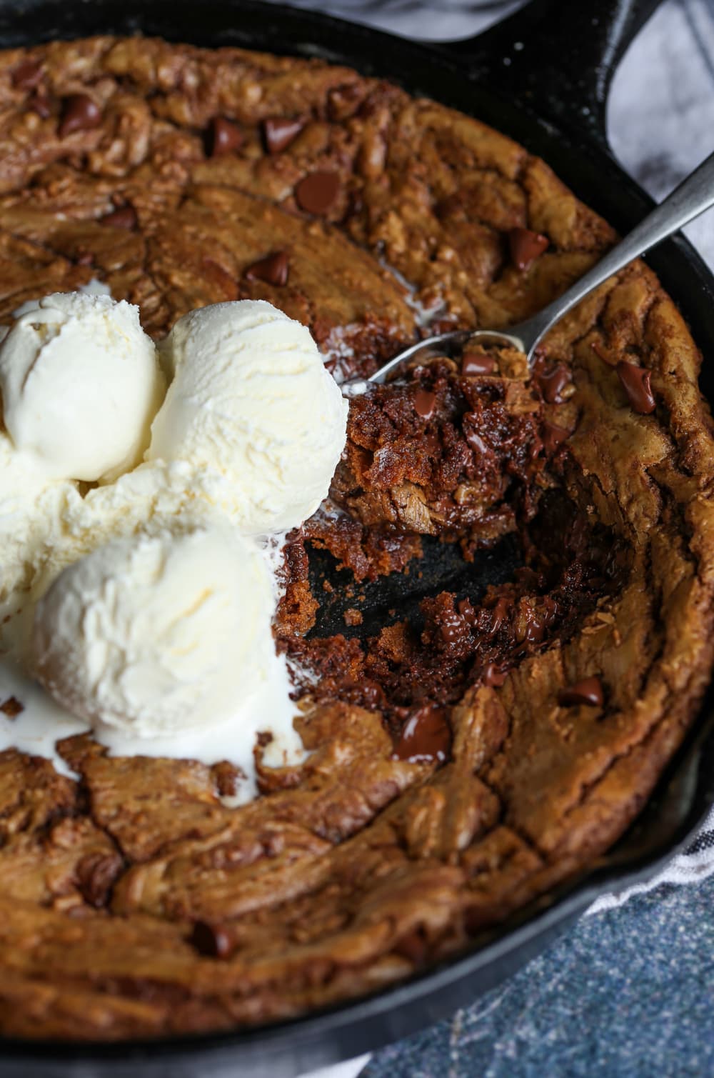 skillet cookie topped with ice cream