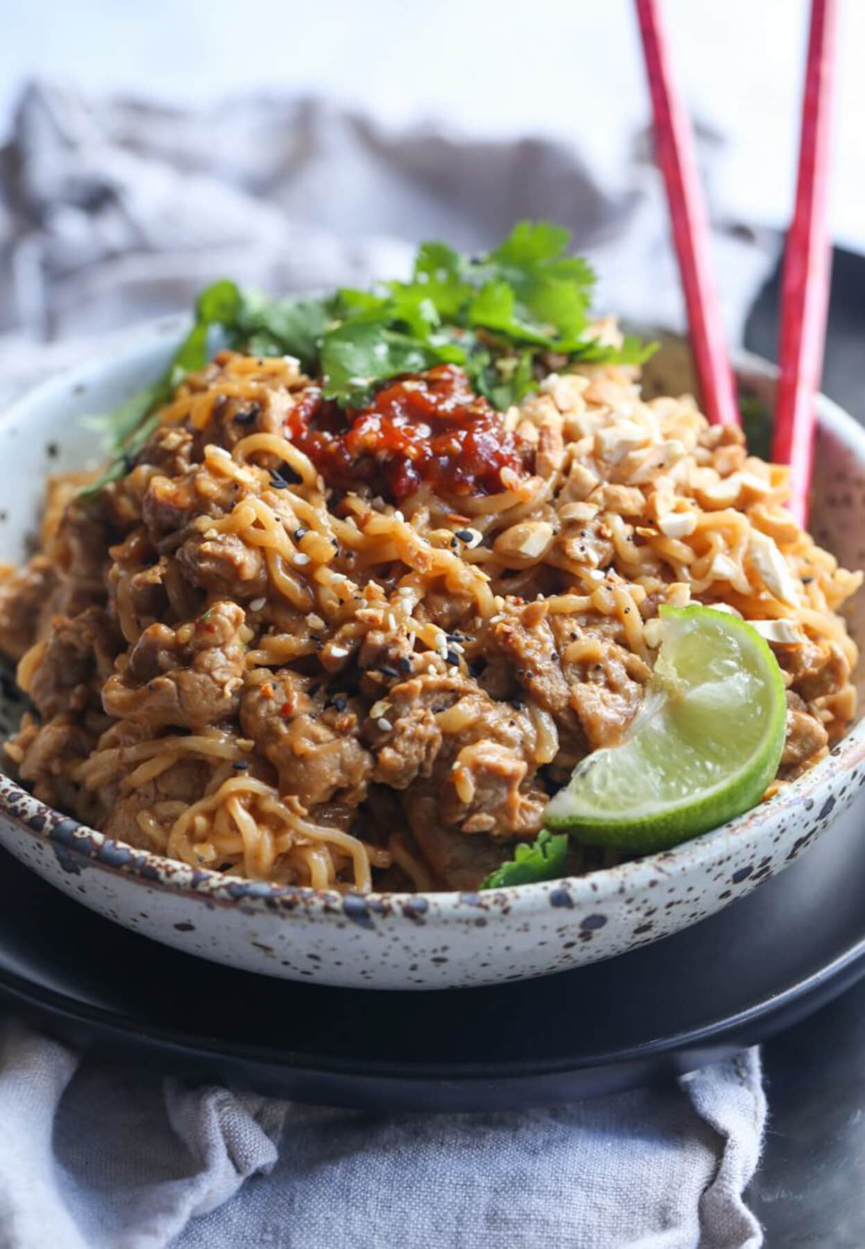 Pork Ramen in a bowl with chili paste on top