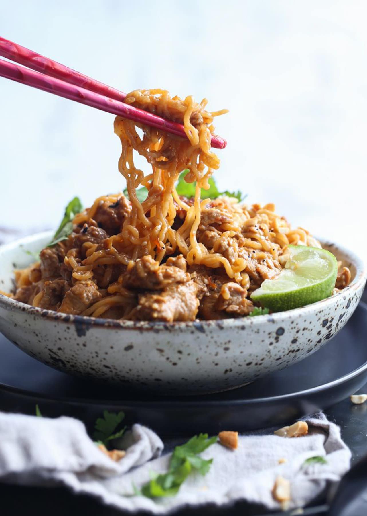 Ramen Noodles in homemade sauce in a bowl with chopsticks