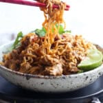 Pork Ramen Noodles in a bowl being eaten