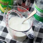 Homemade buttermilk in a measuring cup