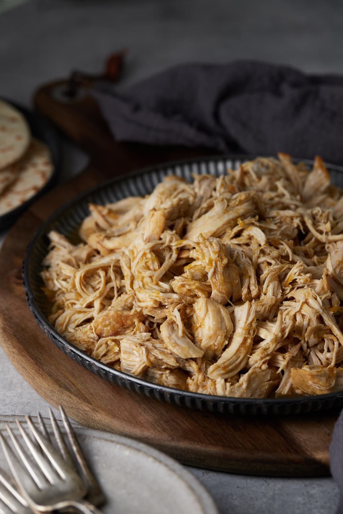 Shredded Salsa Verde Chicken on a plate.