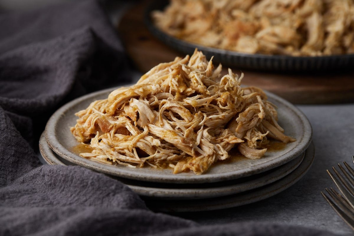 Shredded Salsa Verde Chicken on a plate.