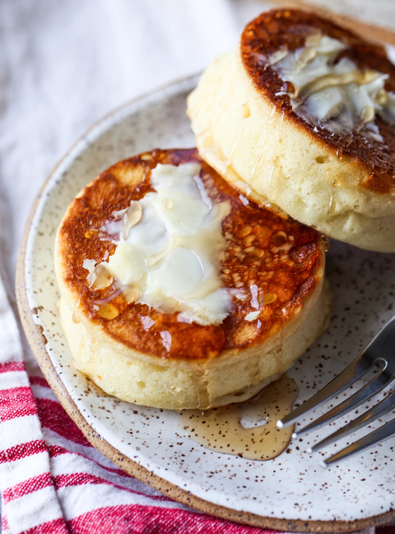 Japanese pancakes with butter and syrup on a plate