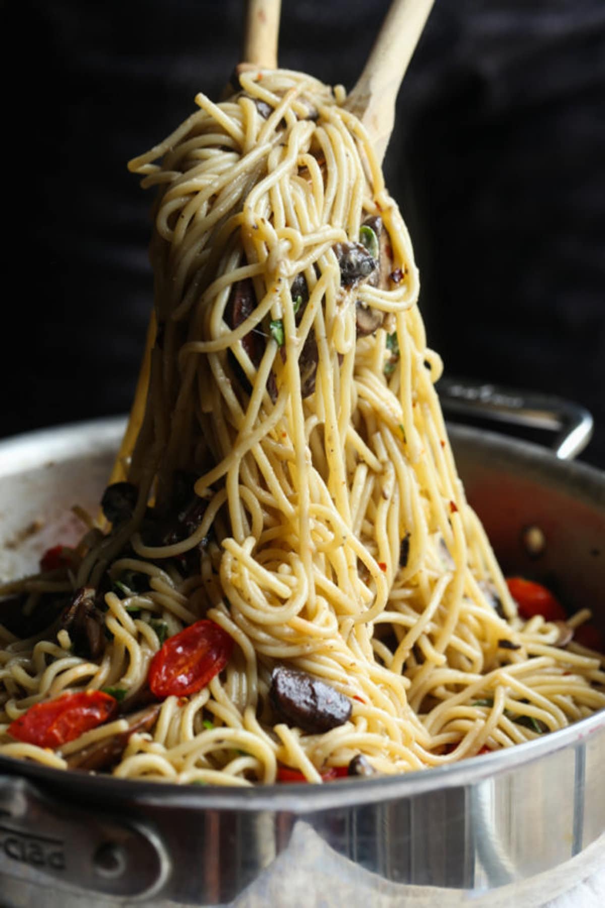 A scoop of mushroom and garlic butter pasta to serve