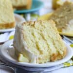 A slice of lemon chiffon cake on a plate.