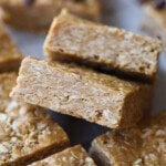 No Bake Oat Squares cut and stacked on parchment paper