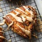 Chocolate Chip Banana Scone with icing drizzled on top