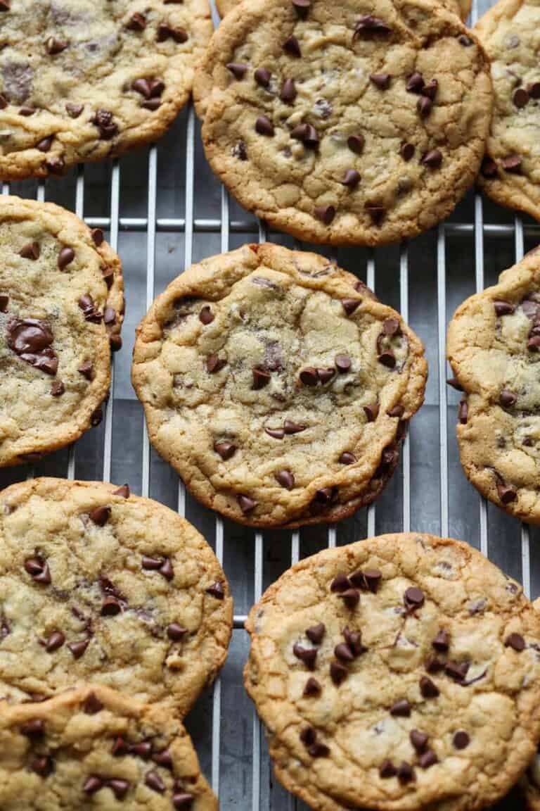 Crunchy chocolate chip cookies on a cooling rack