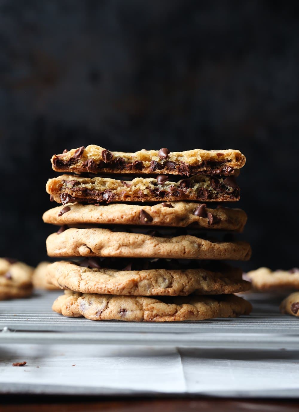 Stacked thin and chewy chocolate chip cookies