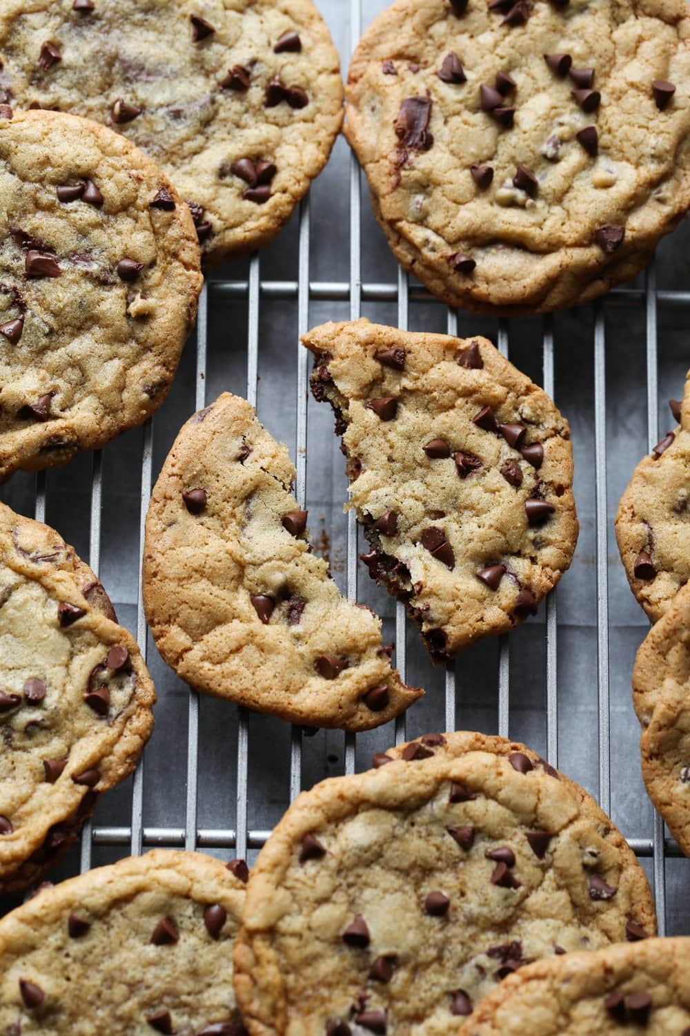 Crispy Chewy Chocolate Chip cookies on a rack from above