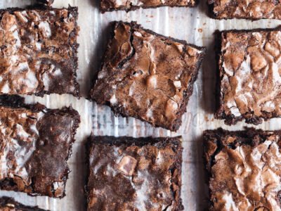 Brownies cut on parchment paper