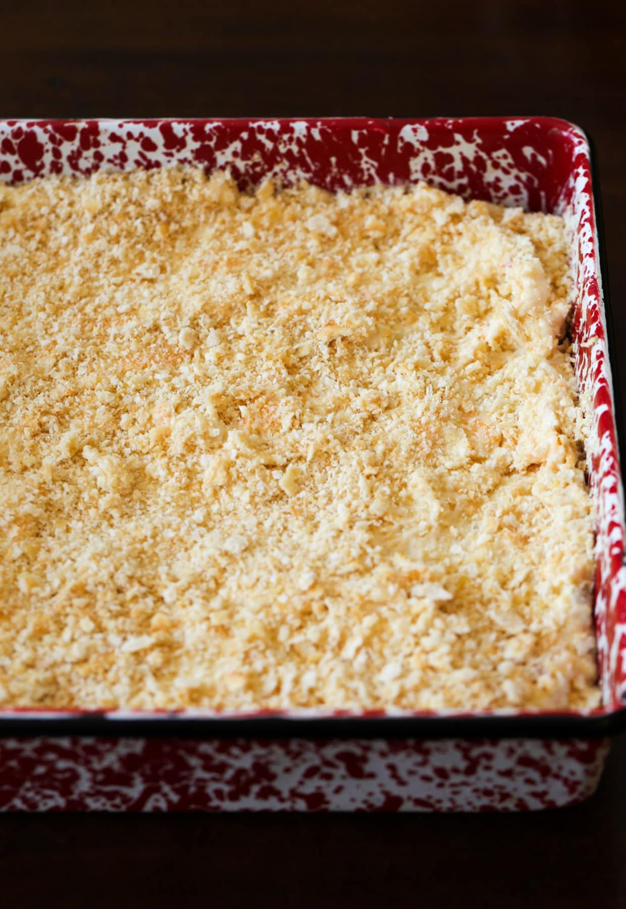 Evenly spread corn casserole mixture in a pan.