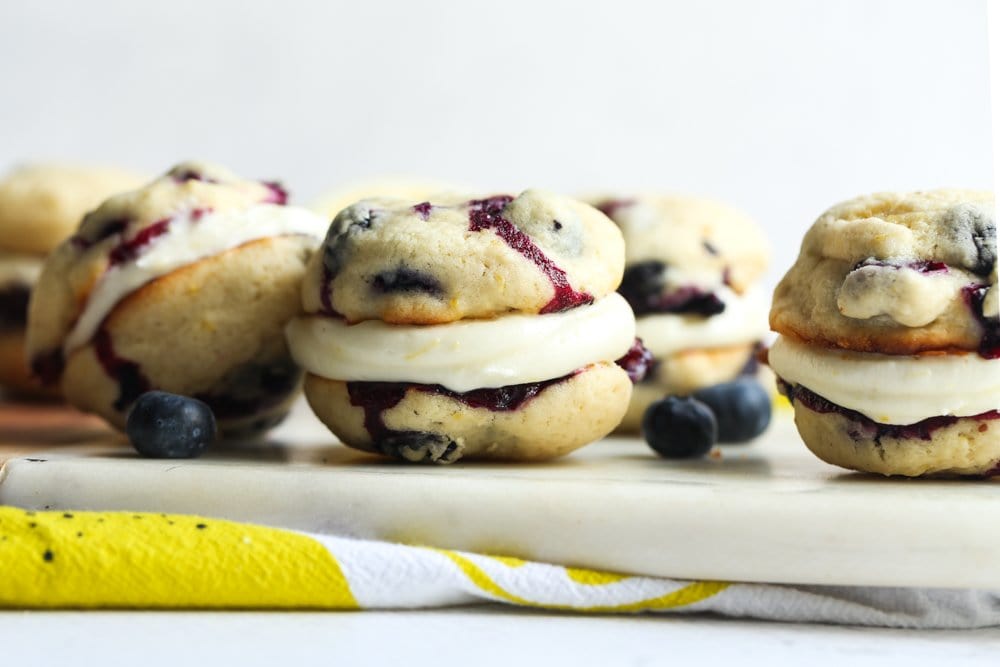 Whoopie Pies with blueberries on a plate