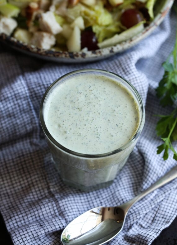 A Small Glass Filled with Ranch Dressing