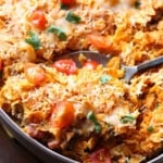 Cheesy Doritos casserole lifted out of pan