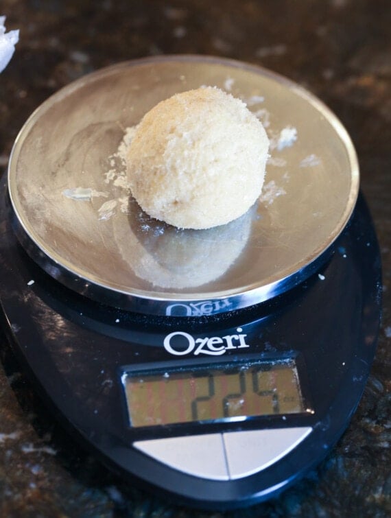 Weighing ball of dough out on a scale