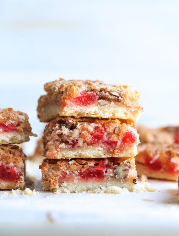 Stacked Cherry Coconut Bars with shortbread crust