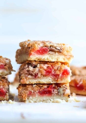 Stacked Cherry Coconut Bars with shortbread crust