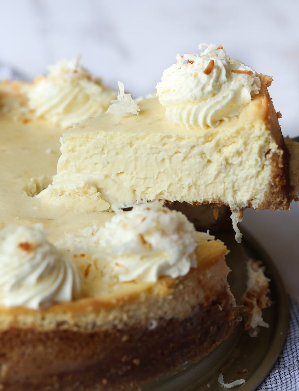Slicing and serving Key Lime Cheesecake