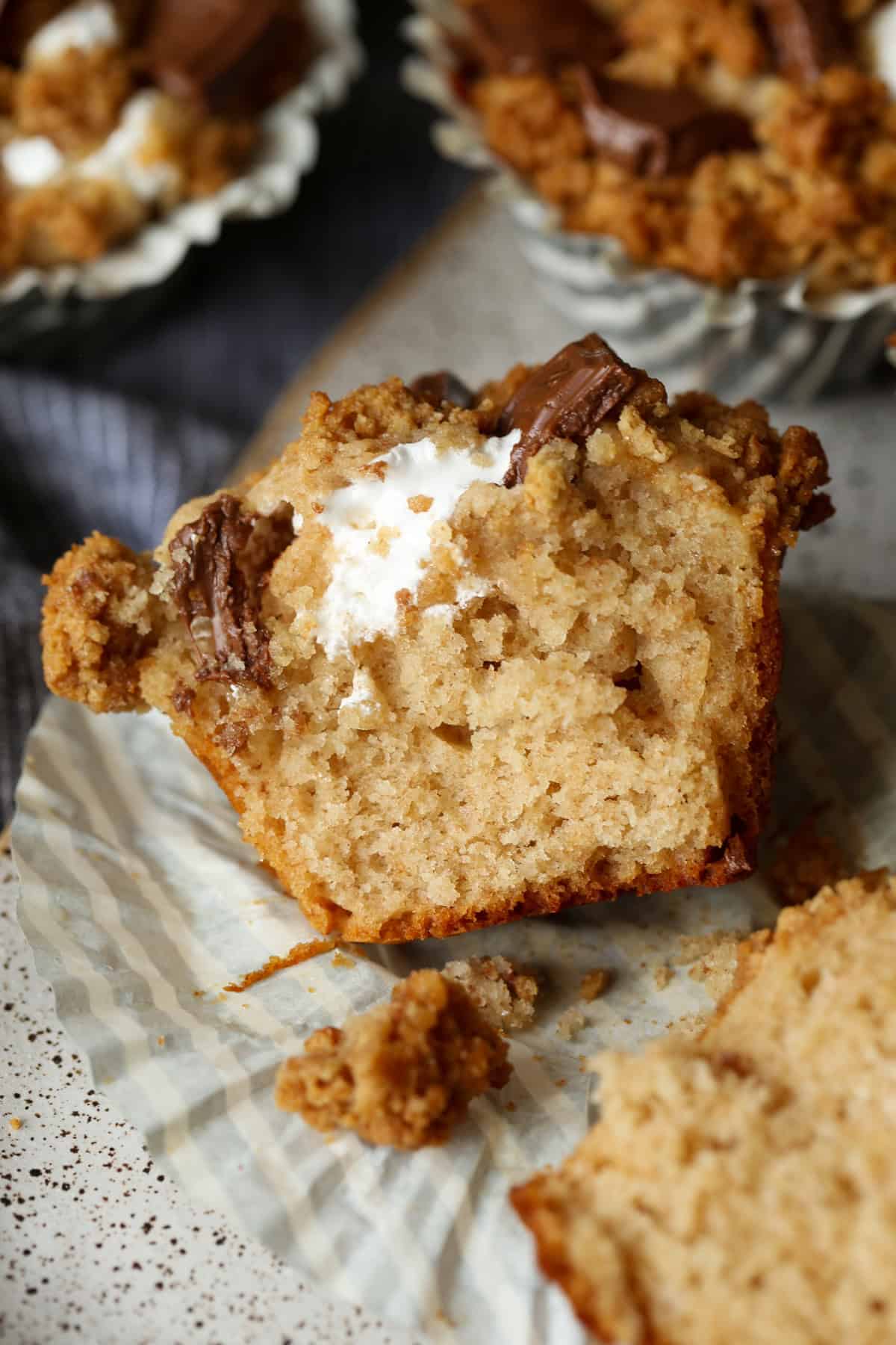 S'mores Muffin cut in half showing the marshmallow cream filling