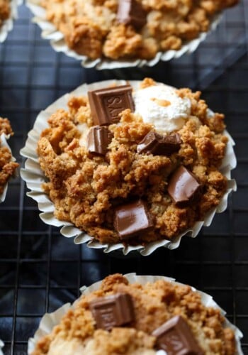 Muffin topped with graham cracker crumble and milk chocolate