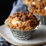 S'mores Muffins on a plate in a cupcake liner
