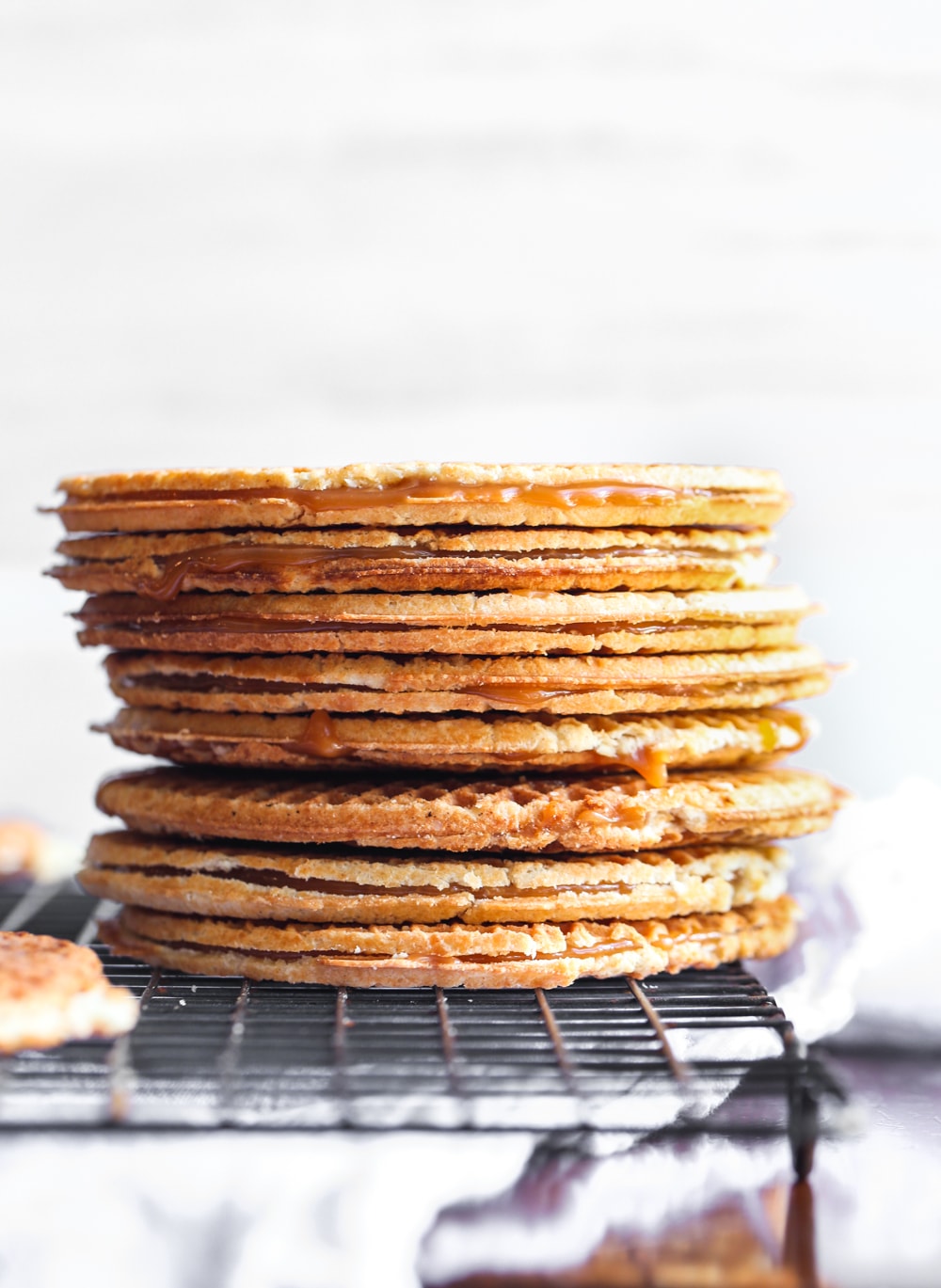 stack of waffle cookies filled with caramel