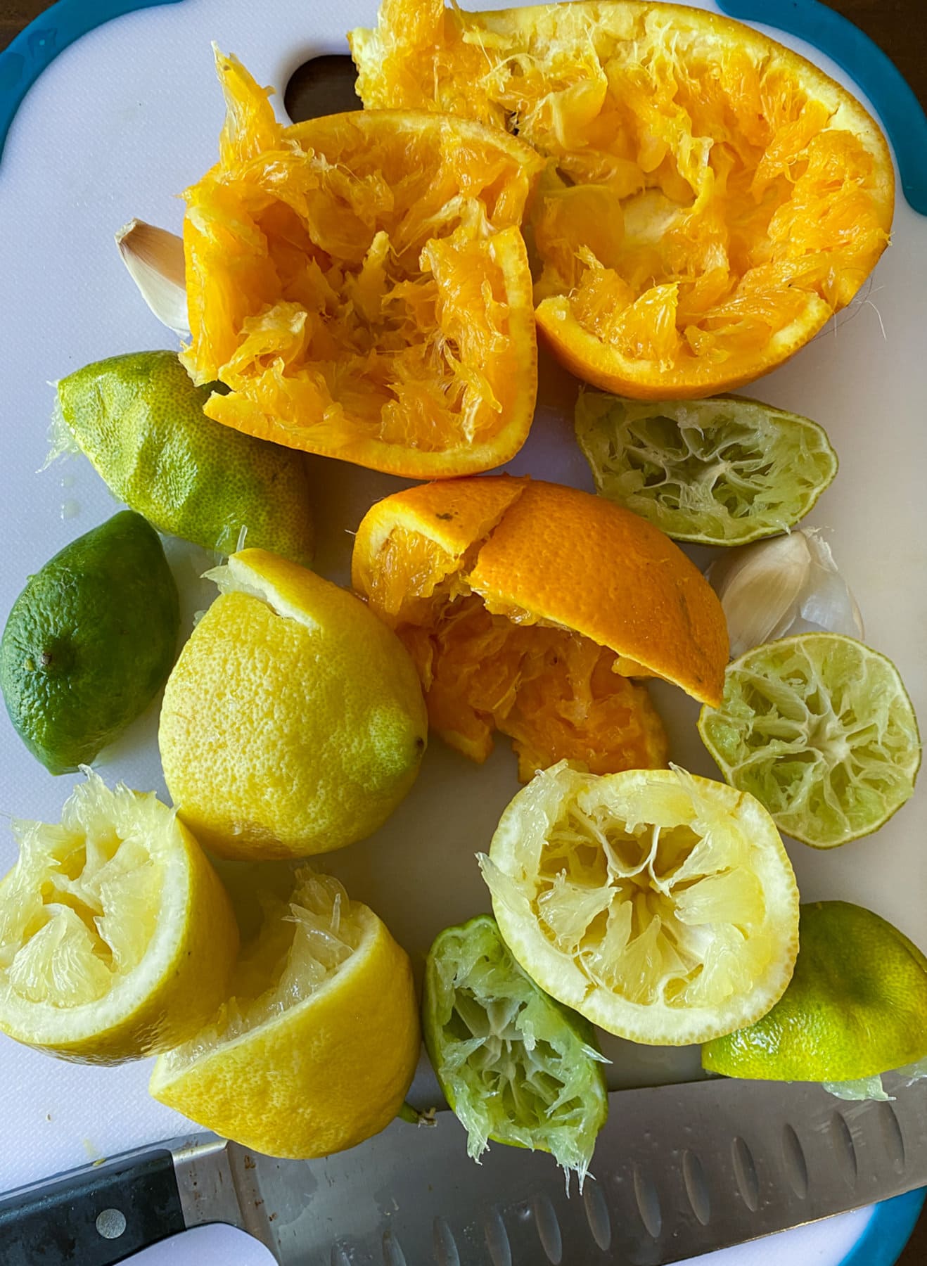 squeezed limes, lemons, and oranges